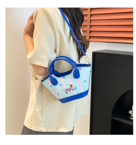Colorful hand-held bucket bag with puppy pattern