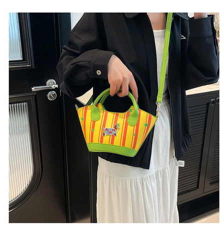 Colorful hand-held bucket bag with puppy pattern