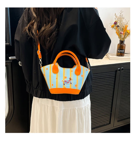 Colorful hand-held bucket bag with puppy pattern